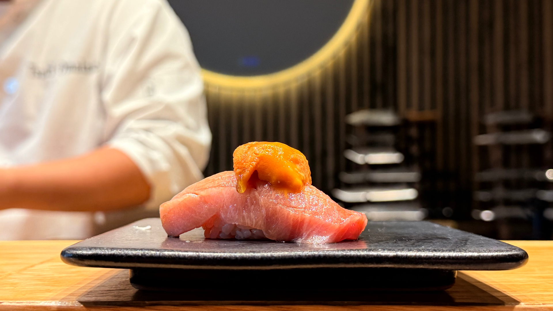 Otoro nigiri crowned with uni at the Tsuki counter